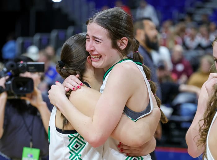 Newcastle's Mattie Dollar celebrates a UIL Class 1A state title win over Turkey Valley on Saturday in San Antonio.